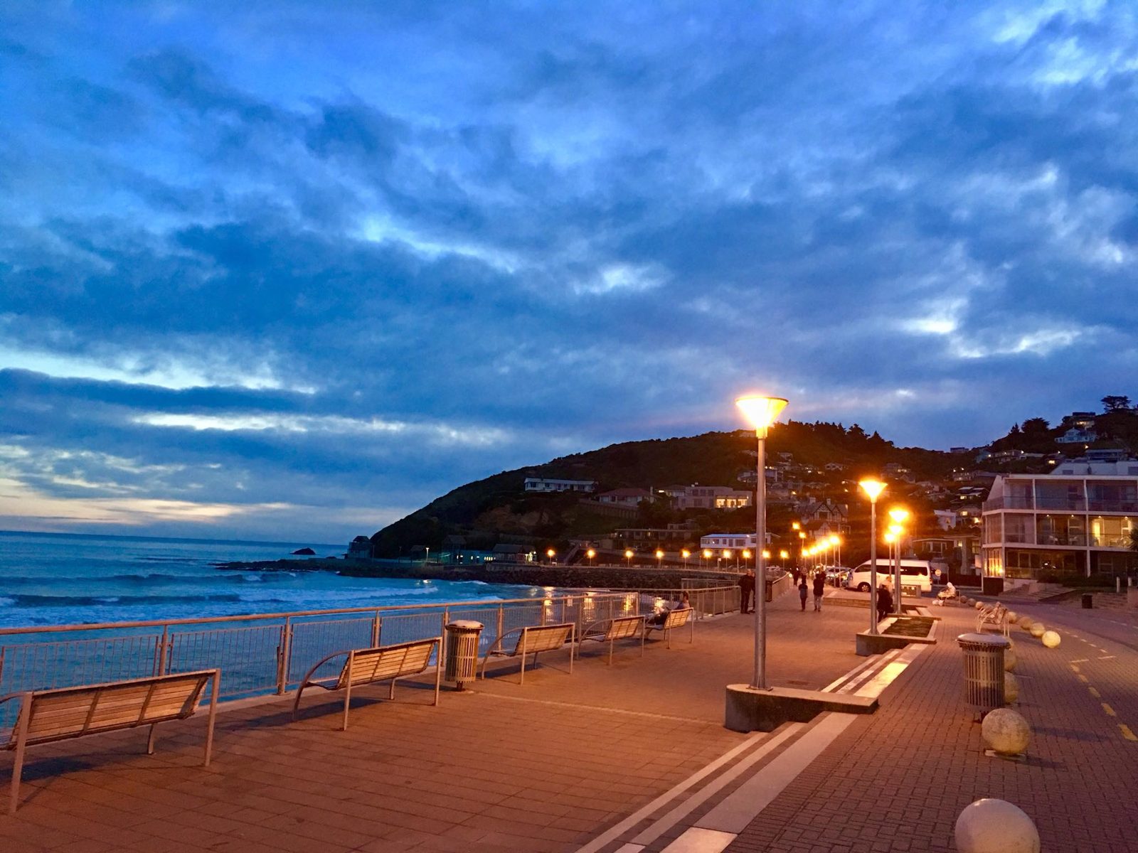 A New Zealand beach promenade at dusk