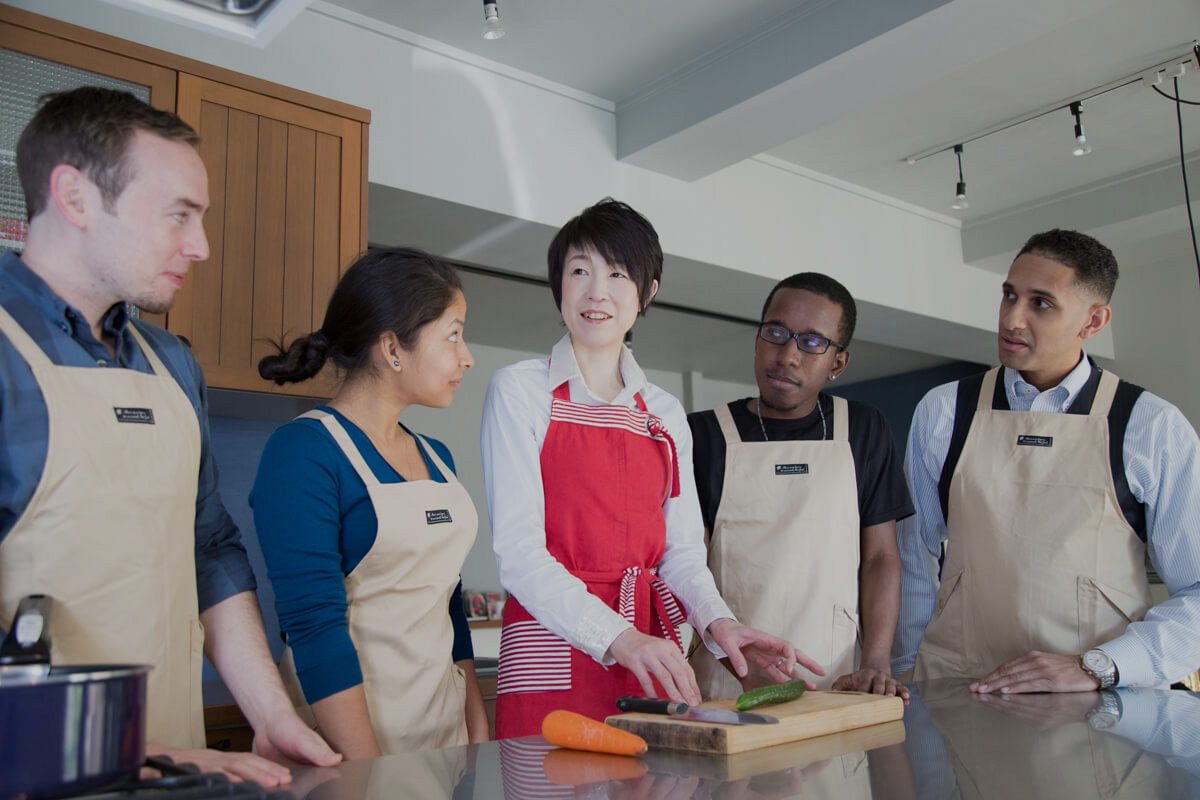 Learners at a Japanese home-cooking class