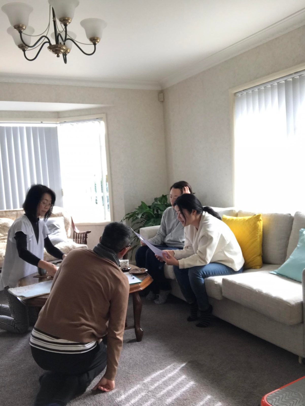A small business meeting in a living room